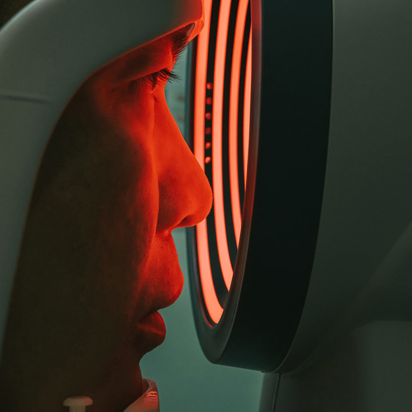 MAn looking through medical machineary